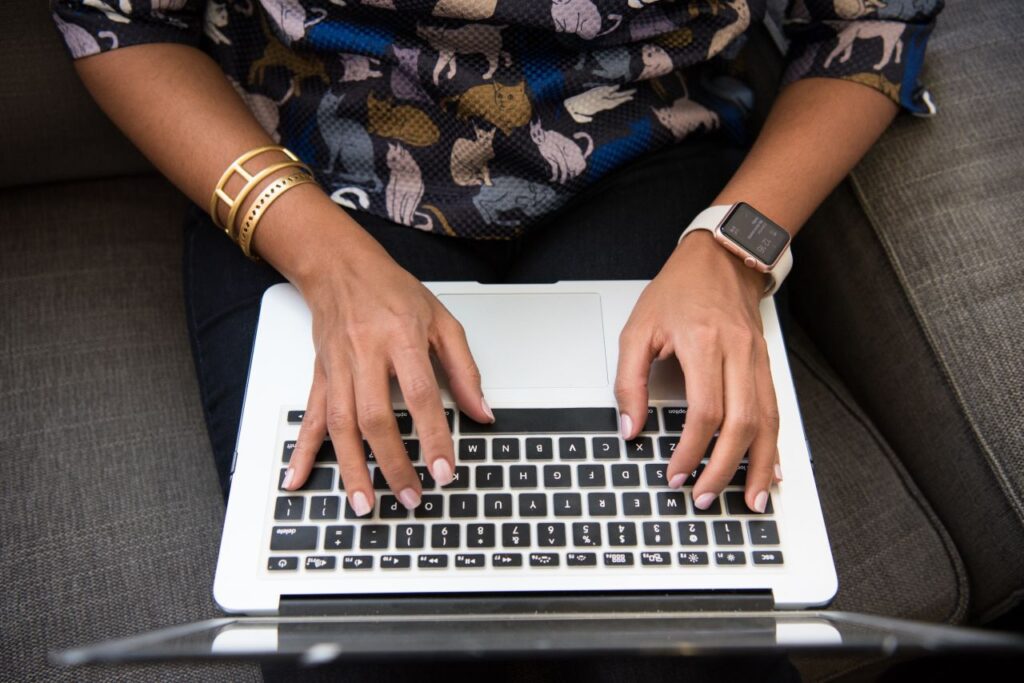 lady writing on laptop